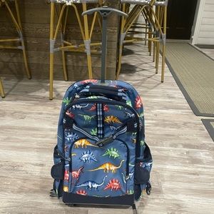 Otters barn roller backpack dinosaur
